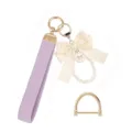 Stylish pearl keychain wristlet with purple woven strap, cute bow, and metal D-ring. - Purple Bow