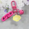 Rosa Schlüsselanhänger mit süßem Muschel-Cartoon-Anhänger für stilvolle Taschen. - Stil 2