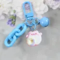 Simpatico portachiavi blu con ciondolo ciambella in peluche, moschettone e campanellino. - Stile 7