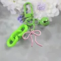 Porte-clés en métal coloré avec nœud rose et chaîne verte pour décoration de sac DIY. - Vert et Rose