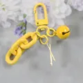 Cute yellow alloy keychain with chain bell and paintbrush charm fashion bag accessory. - Style 1 / Yellow