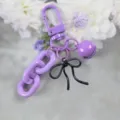 Porte-clés en alliage violet avec nœud élégant, pendentif de sac coloré et cloche. - Violet Et Noir