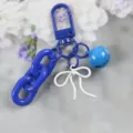 Porte-clés en alliage bleu avec nœud et cloche, charmant pendentif DIY pour sac à main. - Bleu et Blanc