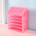 Pink desktop cosmetic storage organizer with multi-tier mesh trays and slanted top compartments. - Pink