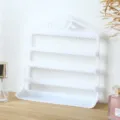 White plastic jewelry display rack with 4 tiers and tray, perfect for earrings and rings. - White