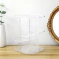 Clear rotating acrylic cosmetic organizer for desktop makeup skincare storage and neat vanity display. - Clear
