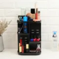 Black rotating makeup organizer for cosmetics, lipstick, and practical desktop storage. - Black Rounded Corner Storage Box