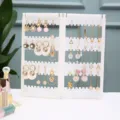 Verstevigd kunststof oorbellen display standaard creatief paravent sieraden organizer houder. - 3 panelen met 180 gaten / Wit