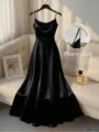 Elegant black satin slip dress featuring handmade pearl straps and a flattering fitted waist silhouette. - Black