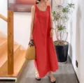 Detailed view of women's red sleeveless linen long dress, casual loose fit and elegant round neck. - Salmon Red