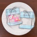 Niedliche Cartoon geformte selbstklebende Verpackungsbeutel mit Schlüsselanhänger für Schmuck. - Stil 03 (Gesamtlänge 8cm) / 10er Pack / Blau
