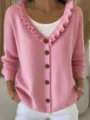 Detailed view of the stylish pink v-neck cardigan sweater with cute ruffle collar and buttons. - S / Tops / Pink