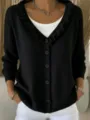 Detailed view of women's black cardigan featuring ruffled v-neck, chic buttons, and knit texture. - S / Tops / Black