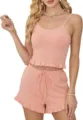 Detail shot of women's ribbed cami top and ruffle shorts pajama set in solid peach pink. - XS / Top And Bottom / Pink