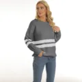 Detailed view of a stylish grey striped knit sweater for women, perfect for autumn and winter wear. - S / Tops / Gray