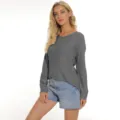 Close-up view of the knitted sweater texture, v-neck collar and long sleeves detail. - S / Tops / Gray
