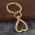 Mosquetón de corazón de aleación de zinc dorado llavero accesorio metálico para joyas. - Dorado