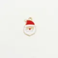 Close up of a cute Santa Claus enamel metal charm pendant for DIY bracelets and necklaces. - Small Santa Head