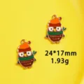 Detail view of the cute Thanksgiving owl enamel alloy pendant charm for DIY jewelry making. - 5# Orange Owl