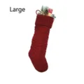 Large red knitted Christmas stocking with wave pattern, holiday gift bag detail view. - L / Red