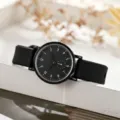 Minimalist black silicone strap quartz watch for women with clean dial and stylish design. - Black