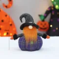 Halloween gnome plush toy with witch hat and purple pumpkin body, perfect desktop decoration. - Der Hochstapler