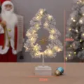 Beflockter leuchtender Weihnachtsbaum mit warmen LED-Lichtern und goldenem Stern für die Festdekoration. - Stil H10548 / Weiß (Schneeflocke)
