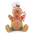 Christmas gingerbread man plush doll detail view, cute chef hat and candy cane design. - Round Hat Style