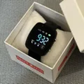Black digital square watch detail view, clear LED display screen, soft silicone strap design. - Black