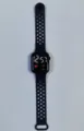 Detailed shot of a black square LED digital sports watch with breathable silicone strap. - Ink Blue