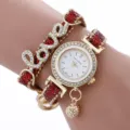 Montre quartz femme mode avec bracelet cuir enveloppant rouge strass design LOVE et pendentif. - Rouge