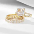 Detail view of 925 silver 5A zircon wedding ring set featuring cushion cut simulated diamond. - Gold 3-Piece Set