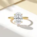 Detailed view of an exquisite 2 carat oval cut moissanite ring set in s925 sterling silver. - Size 5 / Gold