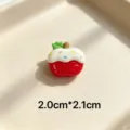 Cute red apple resin charm with white icing and colorful sprinkles, detailed close-up shot. - Sugar Christmas Apple Style 26