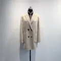Elegant alpaca wool double-breasted coat with peak lapels for women winter fashion style. - S / Oatmeal