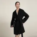 Black hooded wrap coat for women, elegant wool blend winter outerwear with matching belt. - Black