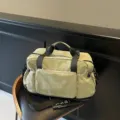 Lightweight multi-functional travel duffel bag with spacious capacity, stylish green design. - Green