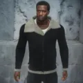 Men's thickened faux fur lapel jacket detailed view showing black body and grey fleece trim. - S / Gray