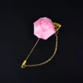 Elegant pink satin rose lapel pin with gold chain and leaf, perfect for wedding suit and dress. - Pink