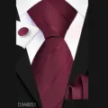 Burgundy men's business necktie set detail showing fine twill fabric texture and matching cufflink. - Burgundy Striped