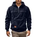 Close-up of men's half-zip hooded sweatshirt detail with multiple pockets and dark blue fabric. - S / Tops / Burgundy