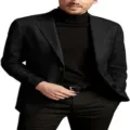 Close-up detail of casual men's black suit blazer jacket paired with a black turtleneck. - M / Black