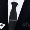 Detail view of men's black texture formal necktie set with silver tie clip and cufflinks. - Zipper Business Style(W6R8007-1)