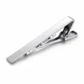 Detail view of matte silver metal tie clip clasp mechanism, polished surface craftsmanship texture - Matte Silver