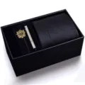 Men's business formal tie gift set featuring a sleek black tie, tie clip, and elegant brooch. - KHVA8041-1B
