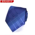 Detailed view of a classic blue men's plaid necktie, perfect for formal business wear. - Business Navy
