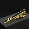 Men's golden tie clip with black enamel inlay, elegant business fashion accessory for formal suits. - Gold