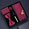Burgundy wedding tie set detail view, featuring pre-tied necktie, bow tie, and matching pocket square. - Zipper Tie | KH5R8053-9A