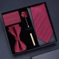 Detailed view of the burgundy tie set box showing textured tie, bow tie, and matching pocket square. - Zipper Tie | KH5R8051-9B
