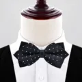Classic black men's bow tie with white geometric pattern, ideal for weddings and formal suits. - Black Plaid (P6010)